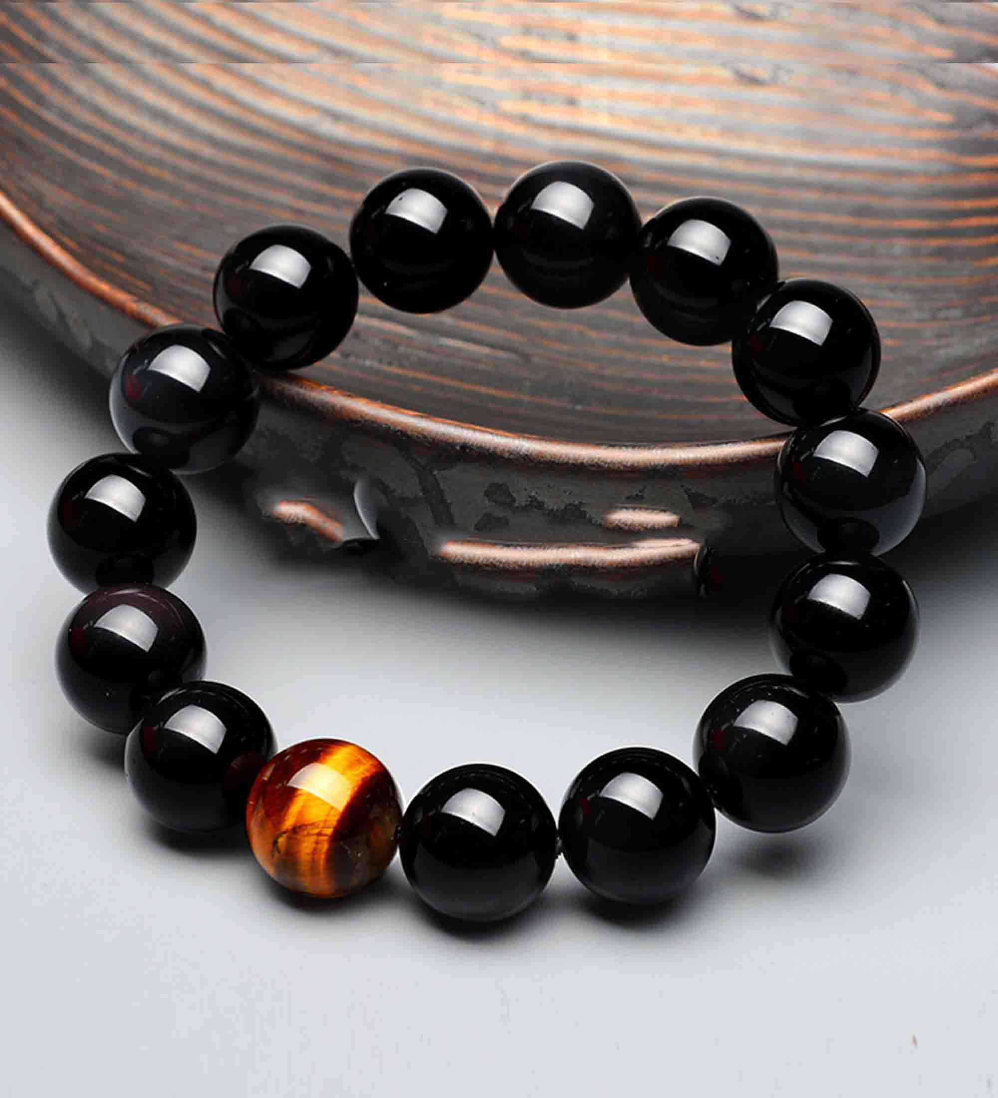 Vòng phong thủy đá obsidian tự nhiên đen bóng