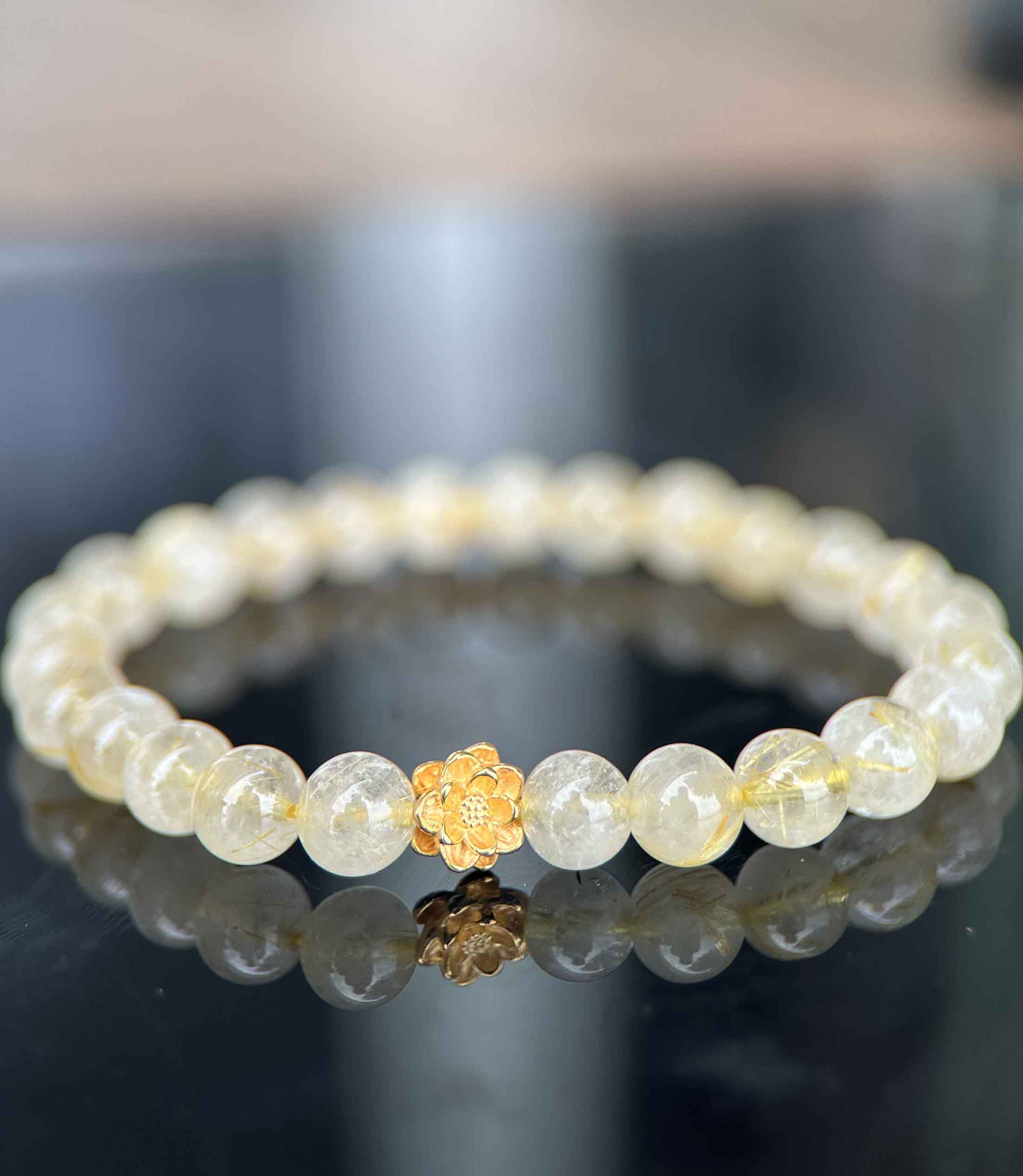 Vòng Tay Đá Thạch Anh Tóc Vàng Tự Nhiên Nữ 6ly Mix Hoa Sen Vàng 24k Xịn